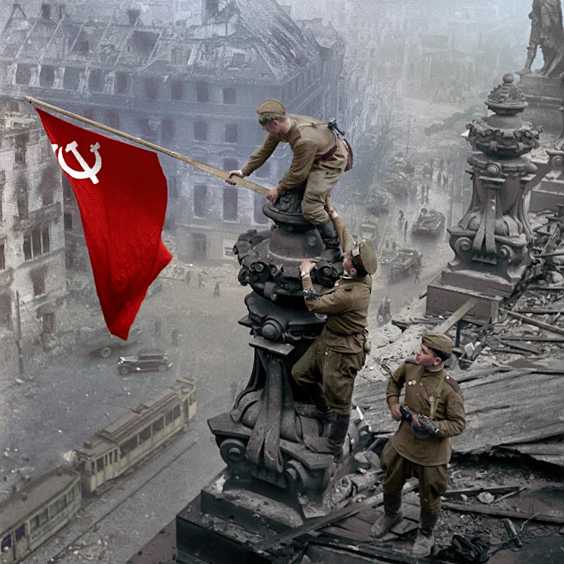 the-soviet-banner-of-victory-raised-by-the-red-army-soldiers-on-the-reichstag-building-in-berlin-on-may-1-1945-photo-by-yevgeni-khaldei-.jpg the-soviet-banner-of-victory-raised-by-the-red-army-soldiers-on-the-reichstag-building-in-berlin-on-may-1-1945-photo-by-yevgeni-khaldei-.jpg